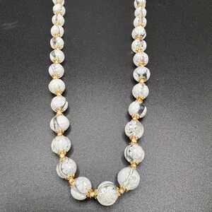 Elegant Gold and White Beaded Necklace